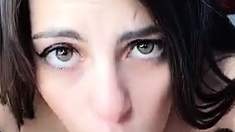 Big tit brunette sucks a big cock POV