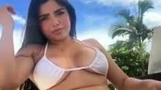 Busty curly brunette with big boobs fucks on couch