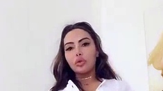 Busty curly brunette with big boobs fucks on couch