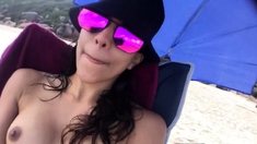 First-time Nudist Hesitates to Undress on Beach