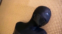 zentai encased and viborated taped bondage girl